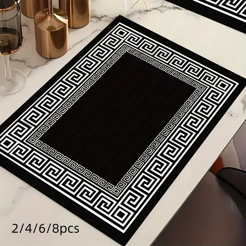 Layoris Tischset mit quadratischem, griechischem Muster in Schwarz und Weiß
